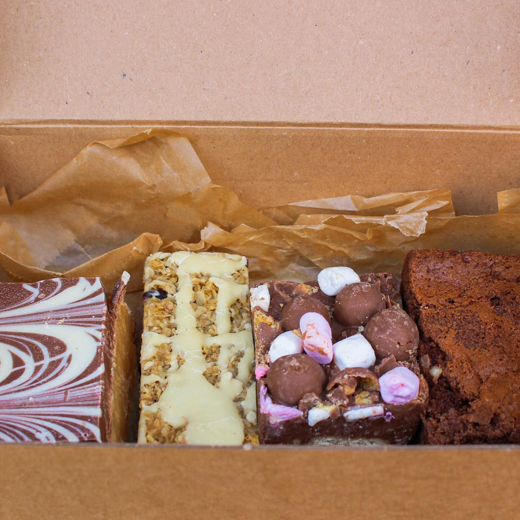 Brownie treat box delivery. Cheshire cake box. Ginger and pickles treat delivery.